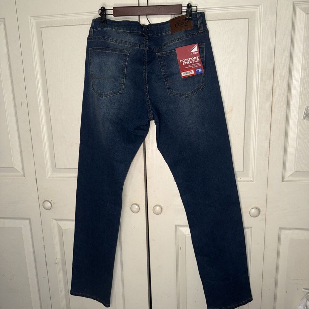 IZOD Men's Comfort Stretch Straight Fit Jean, Size 34X34 Slim Fit Medium Wash - Picture 2 of 5